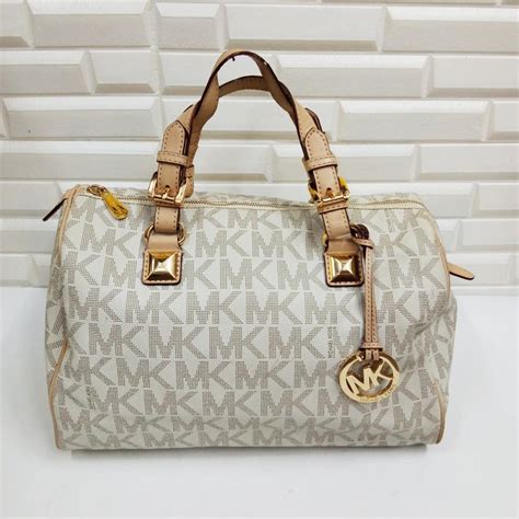 michael kors hamilton fake|Michael Kors counterfeit bags.